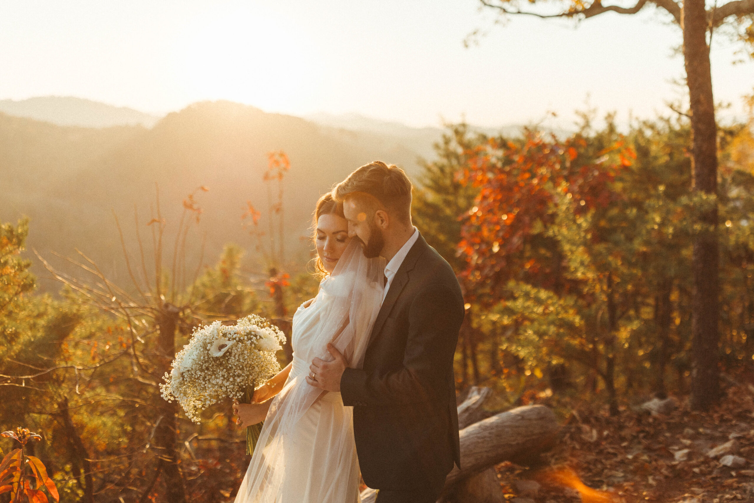 Bride and Groom in the mountains at sunset