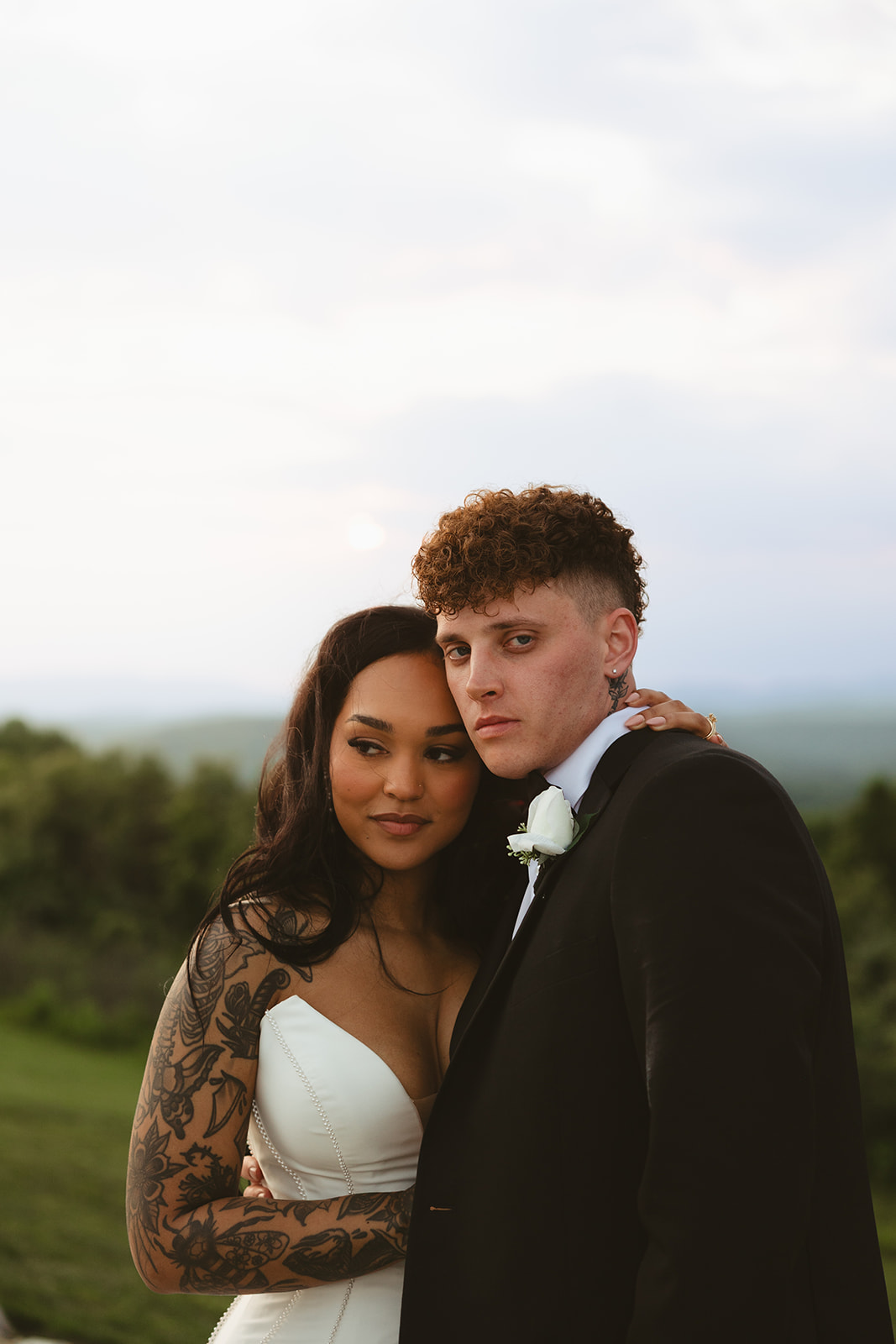 Bride and groom posing for editorial wedding photos