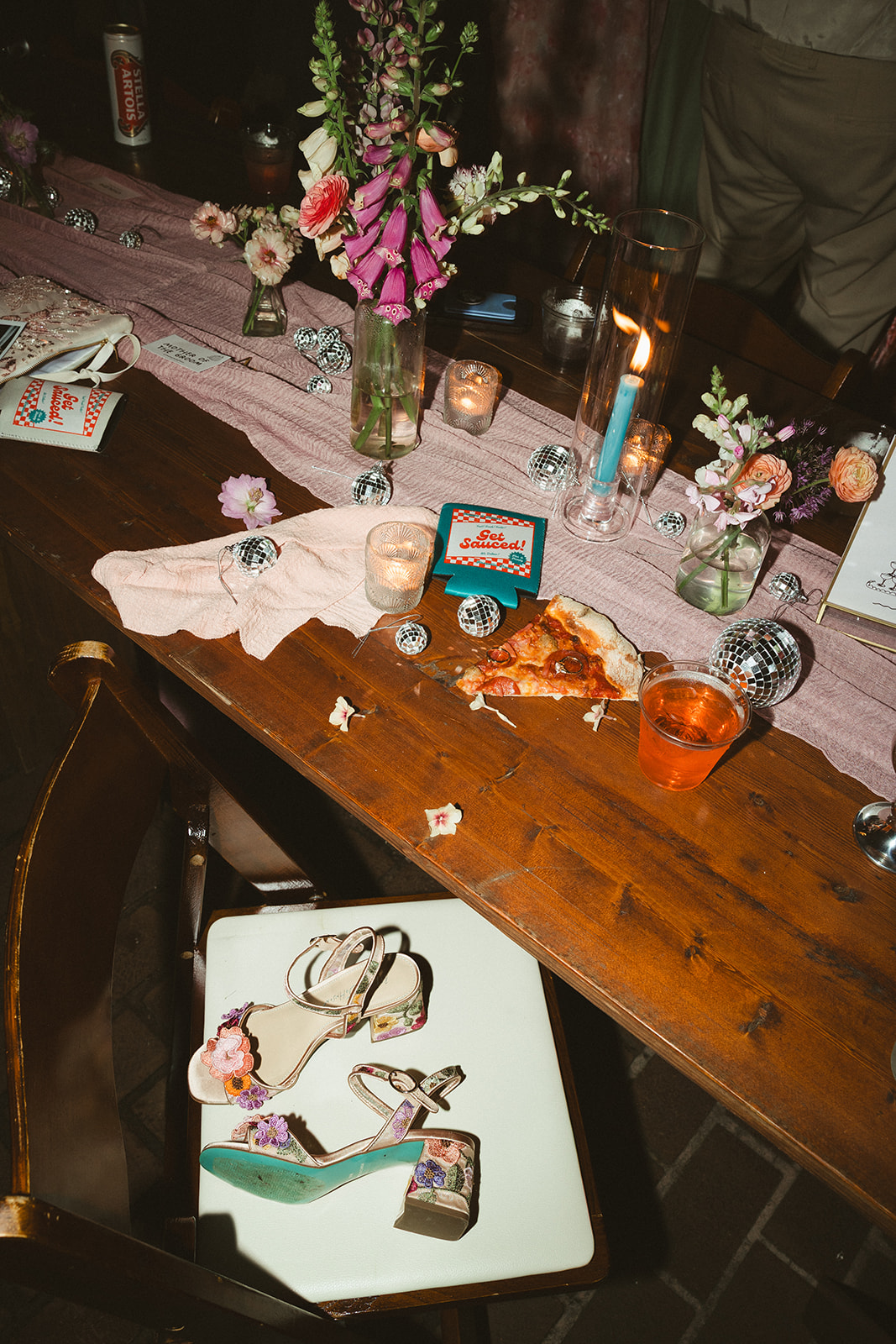 Colorful wedding ideas with disco ball tables, pizza, and colorful wedding decor