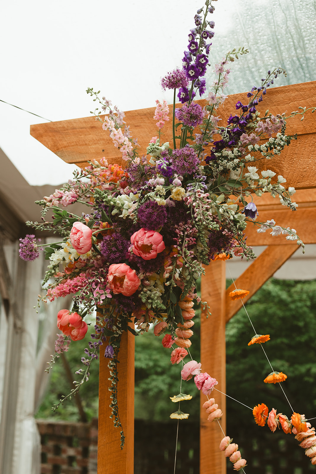 Wedding arch flowers from a colorful wedding ceremony, perfect for wedding ceremony ideas