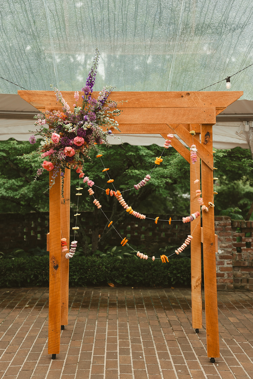 A colorful wedding arch, perfect for colorful wedding ideas
