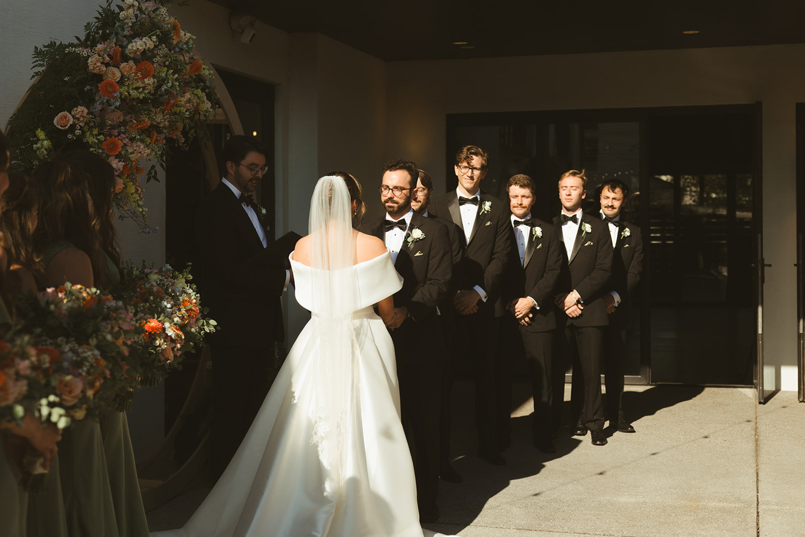 A candid photo of an outdoor wedding ceremony