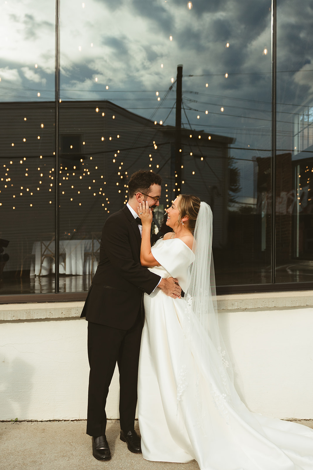 A wedding couple kissing in documentary style wedding photography