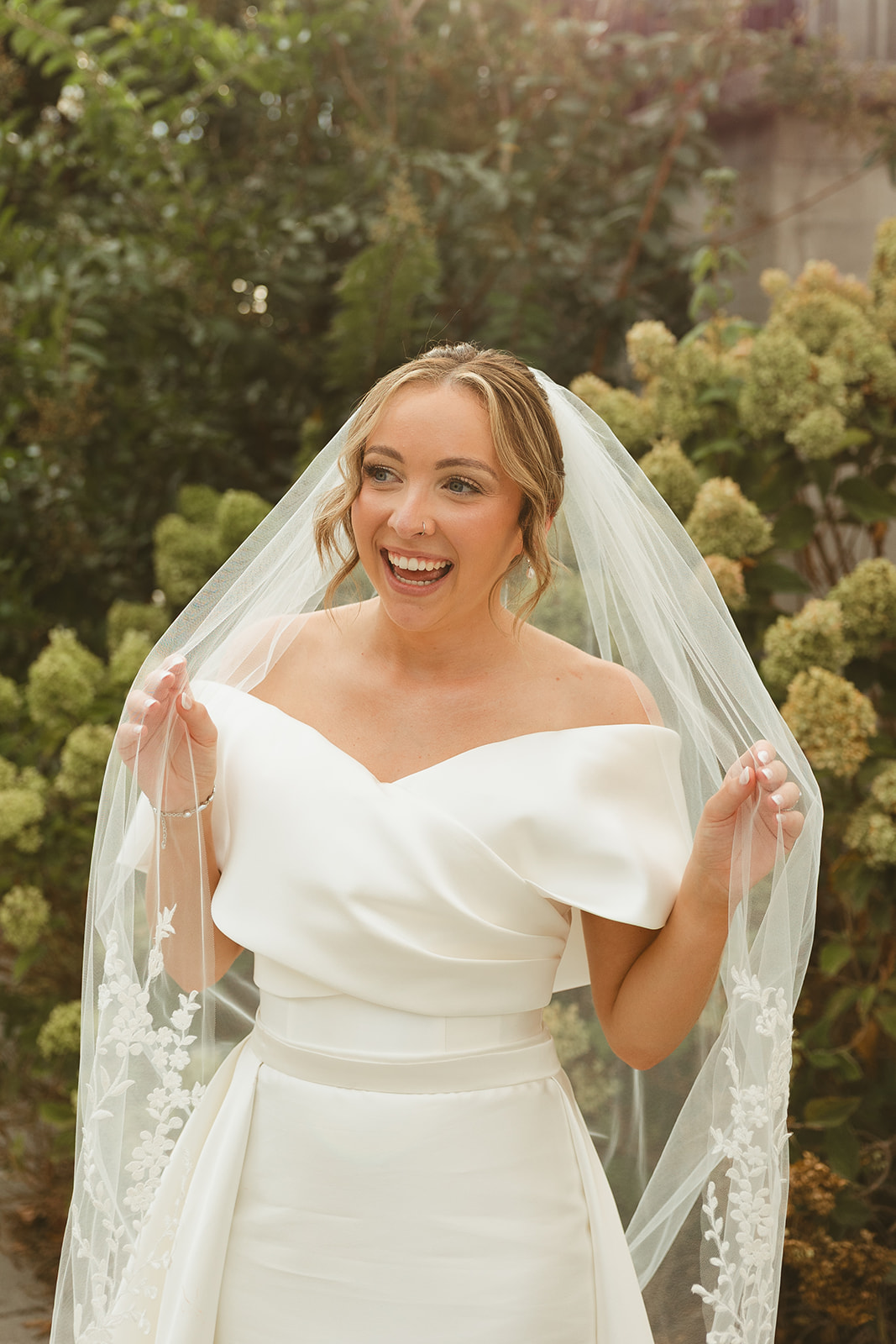 A candid photo of a bride captured through documentary style wedding photography