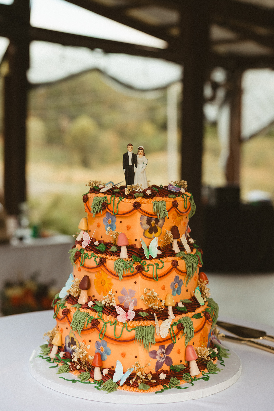 A fairy inspired wedding cake for a wedding at Ancient Lore village