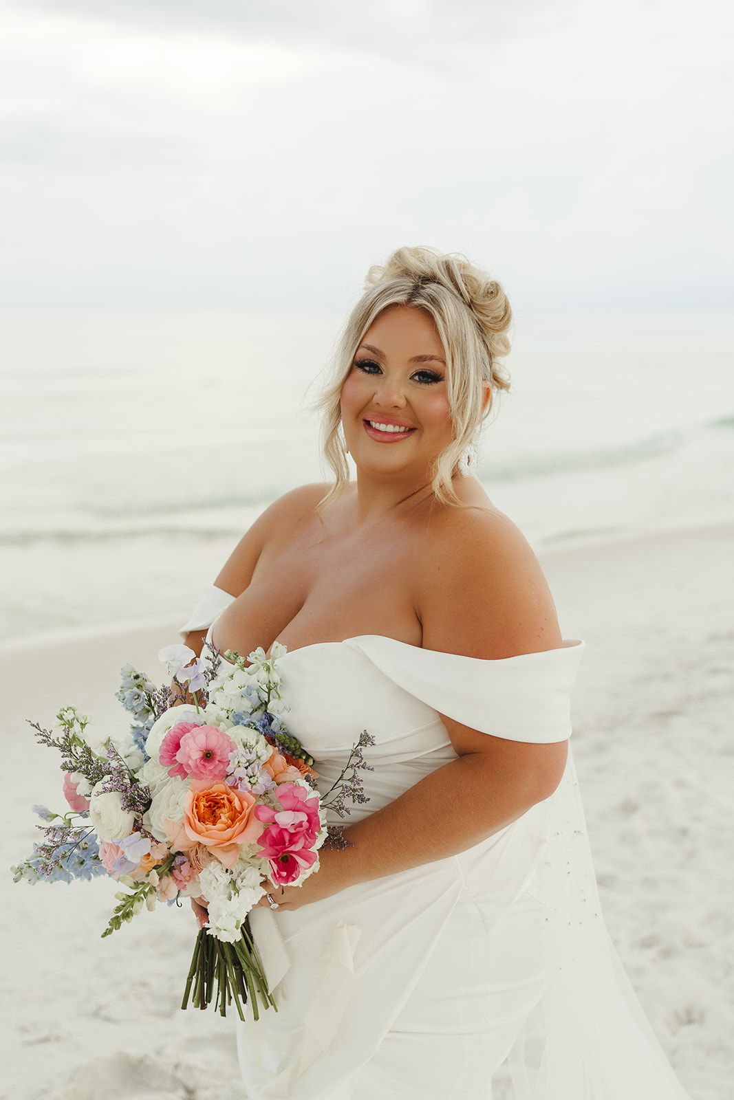 A bride's beach wedding dress on the beach in 30a