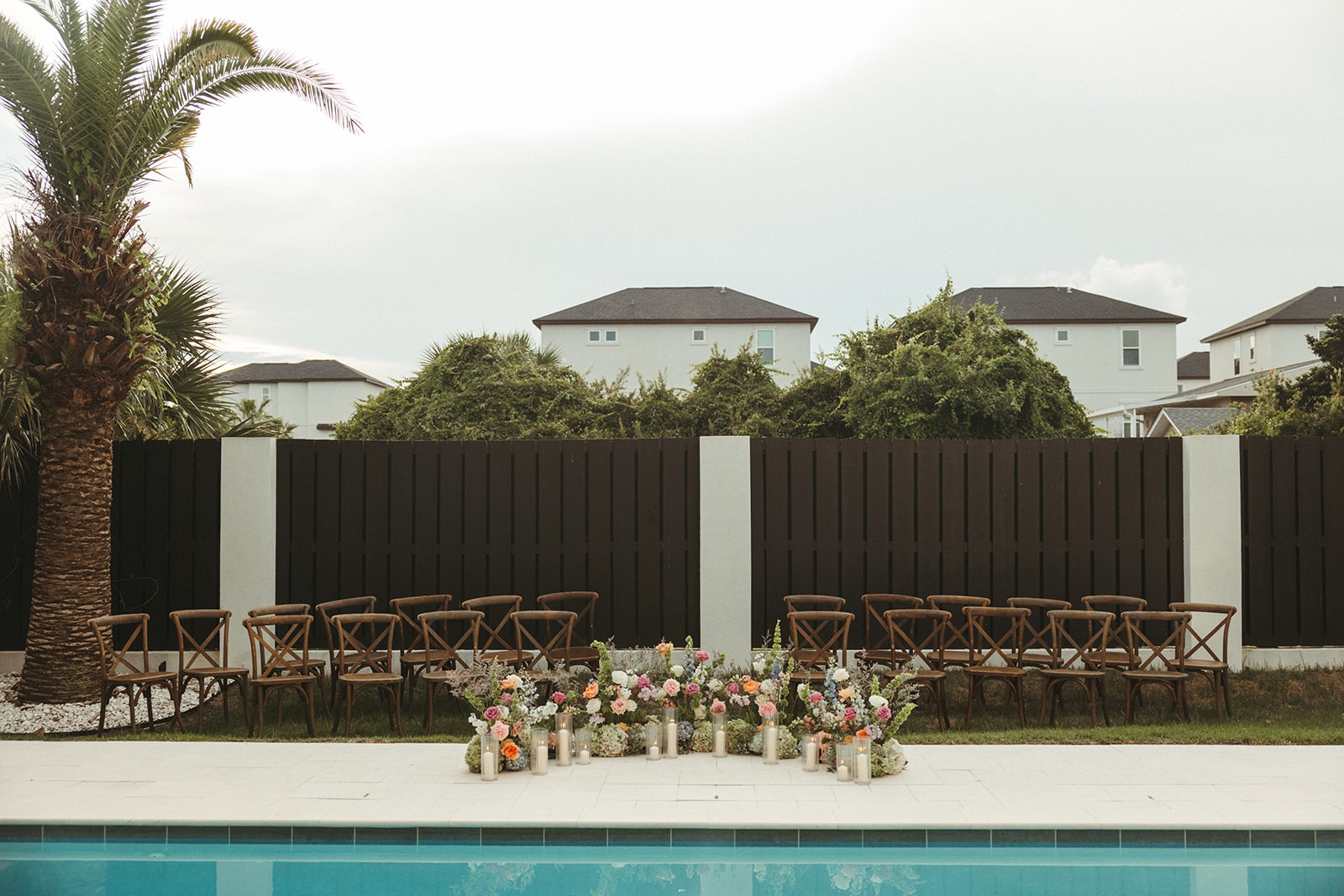 A wedding ceremony setup at an airbnb wedding for a florida beach wedding