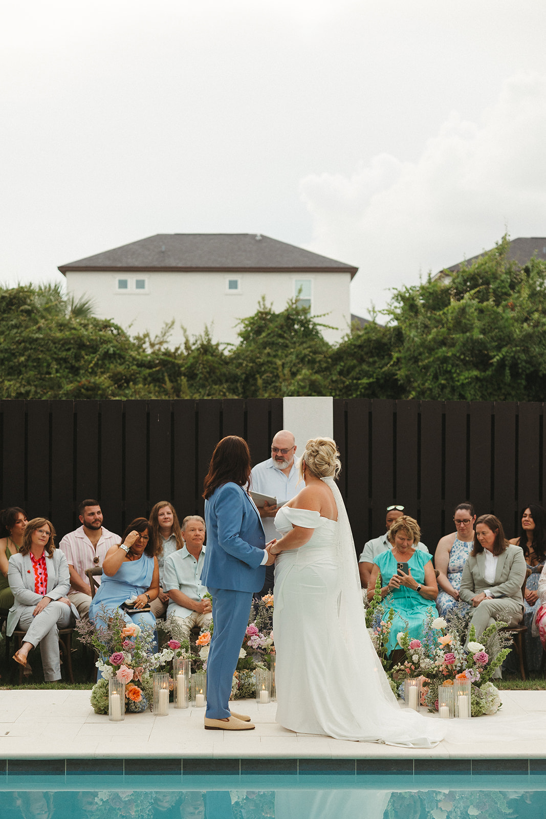 Two brides during their wedding ceremony at their Florida beach wedding