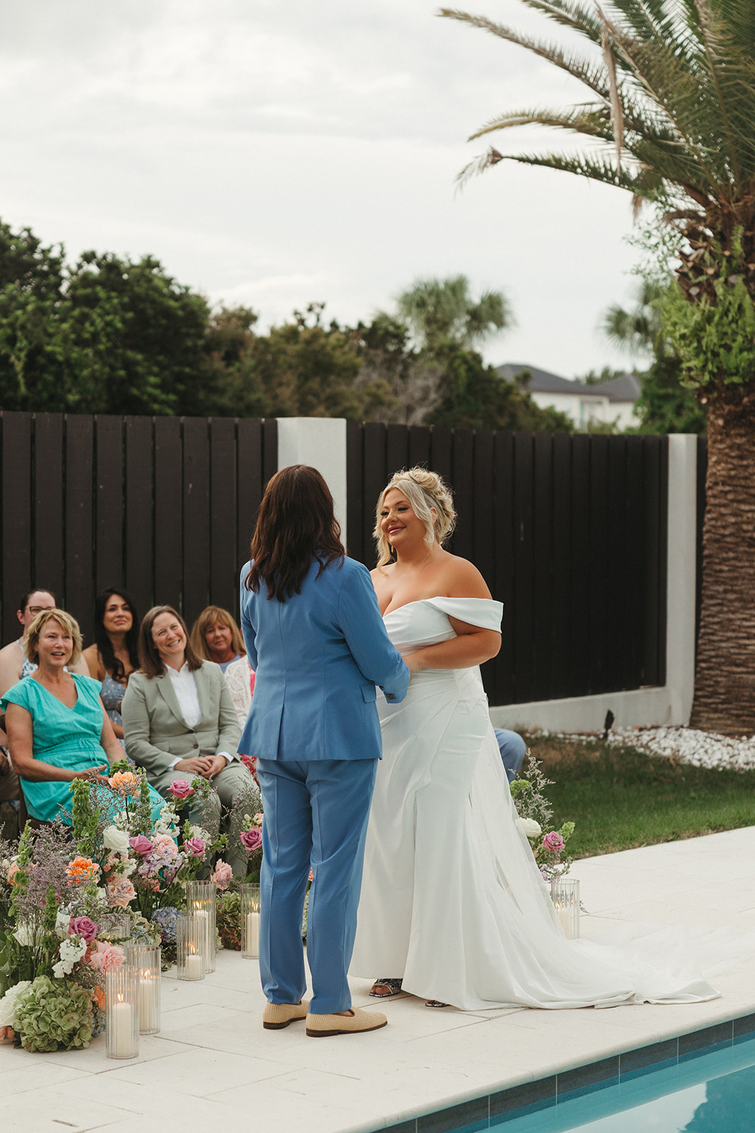 Two brides during their wedding ceremony at their Florida beach wedding