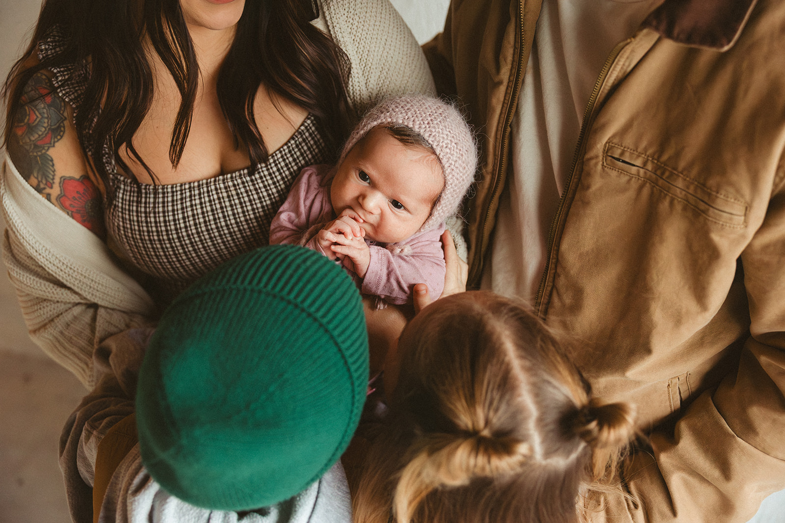An aerial view of a family taking family photos