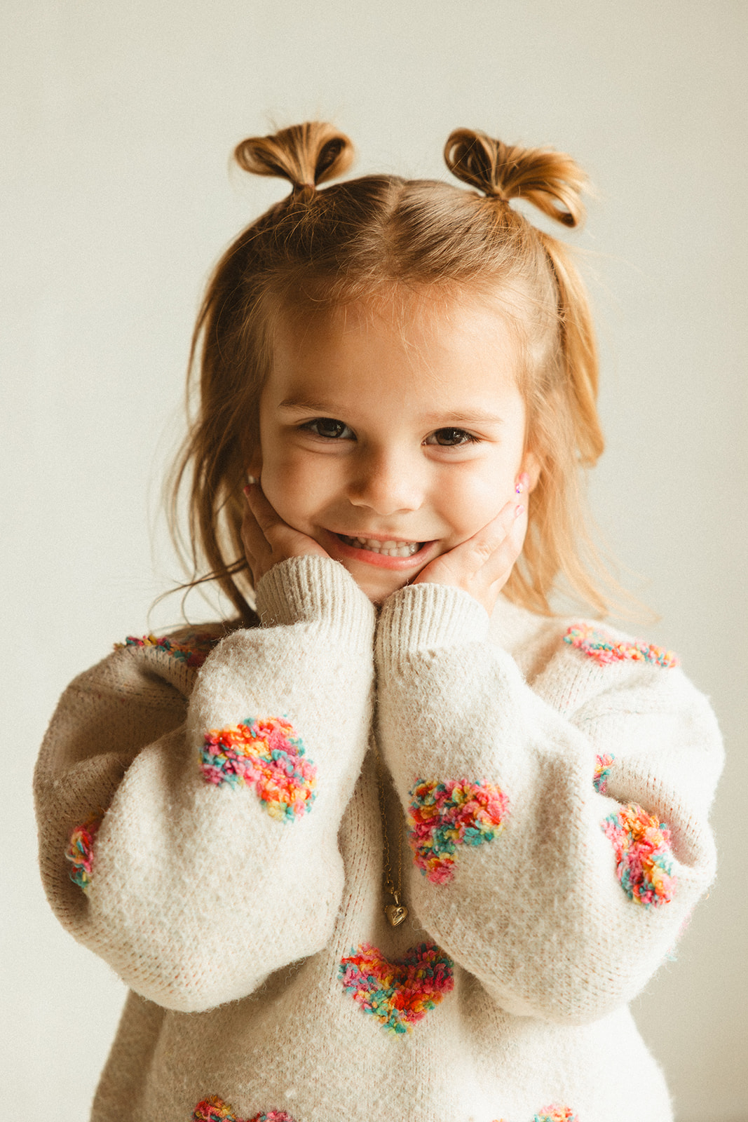 A little girl posing for a photo